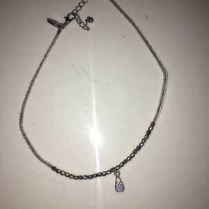 SILVER CHOKER WITH BLUE JEM.